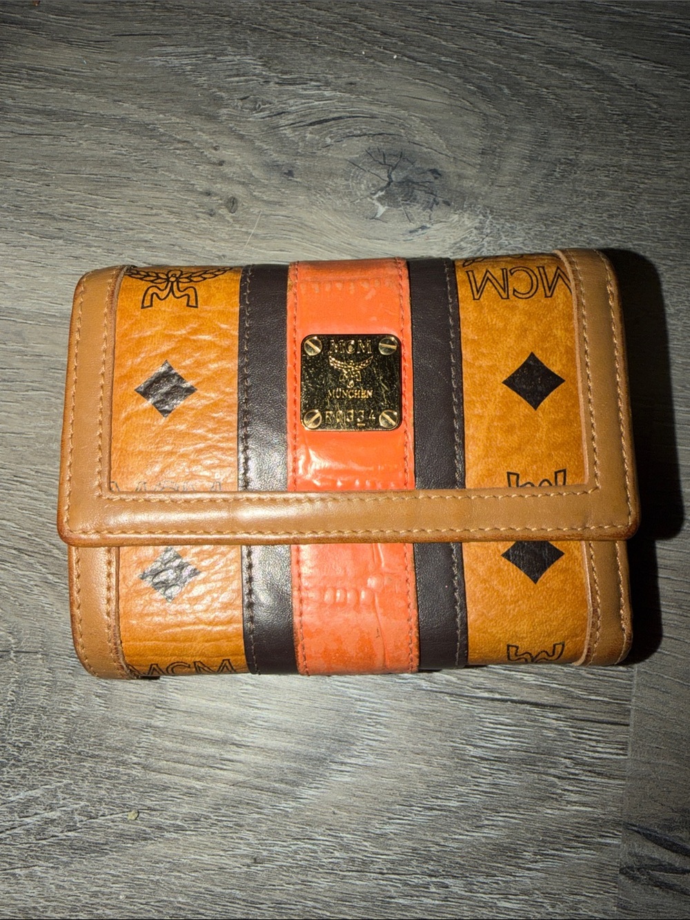 MCM Tri-Panel Monogram Leather Wallet in Tan, Orange and Dark Brown